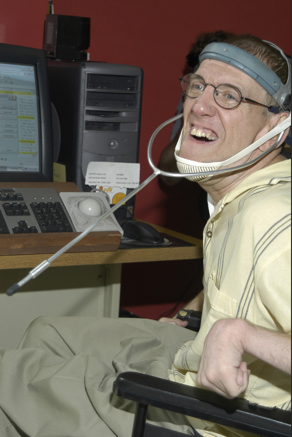 Man working at adaptive computer.