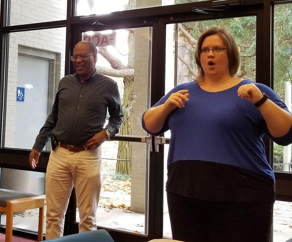 Robert Parrish speaks at the Arts Access International Day of Persons with Disabilities celebration on December 3, 2018.