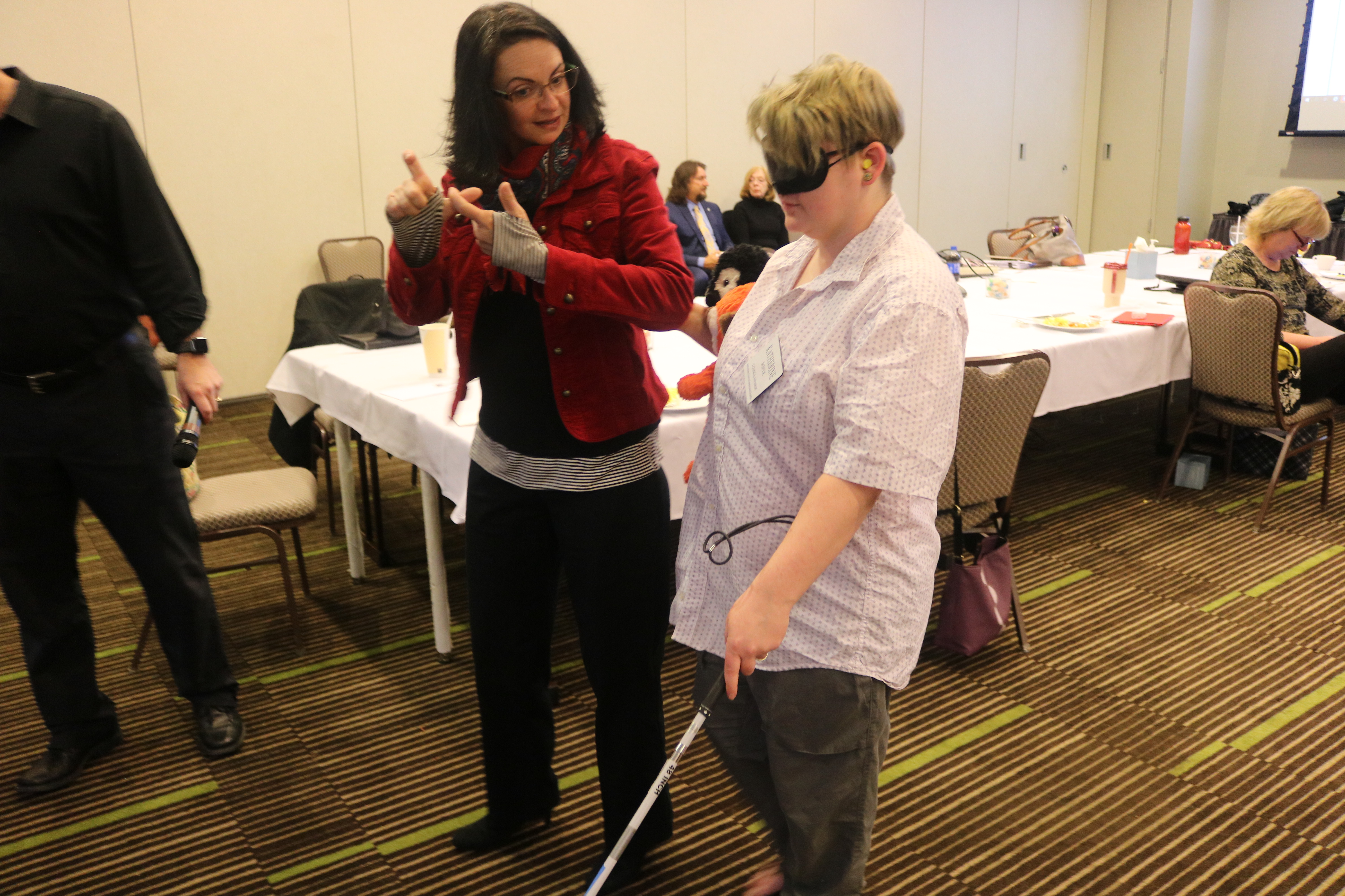 Katherine Boeck does a simulation as a person who is blind