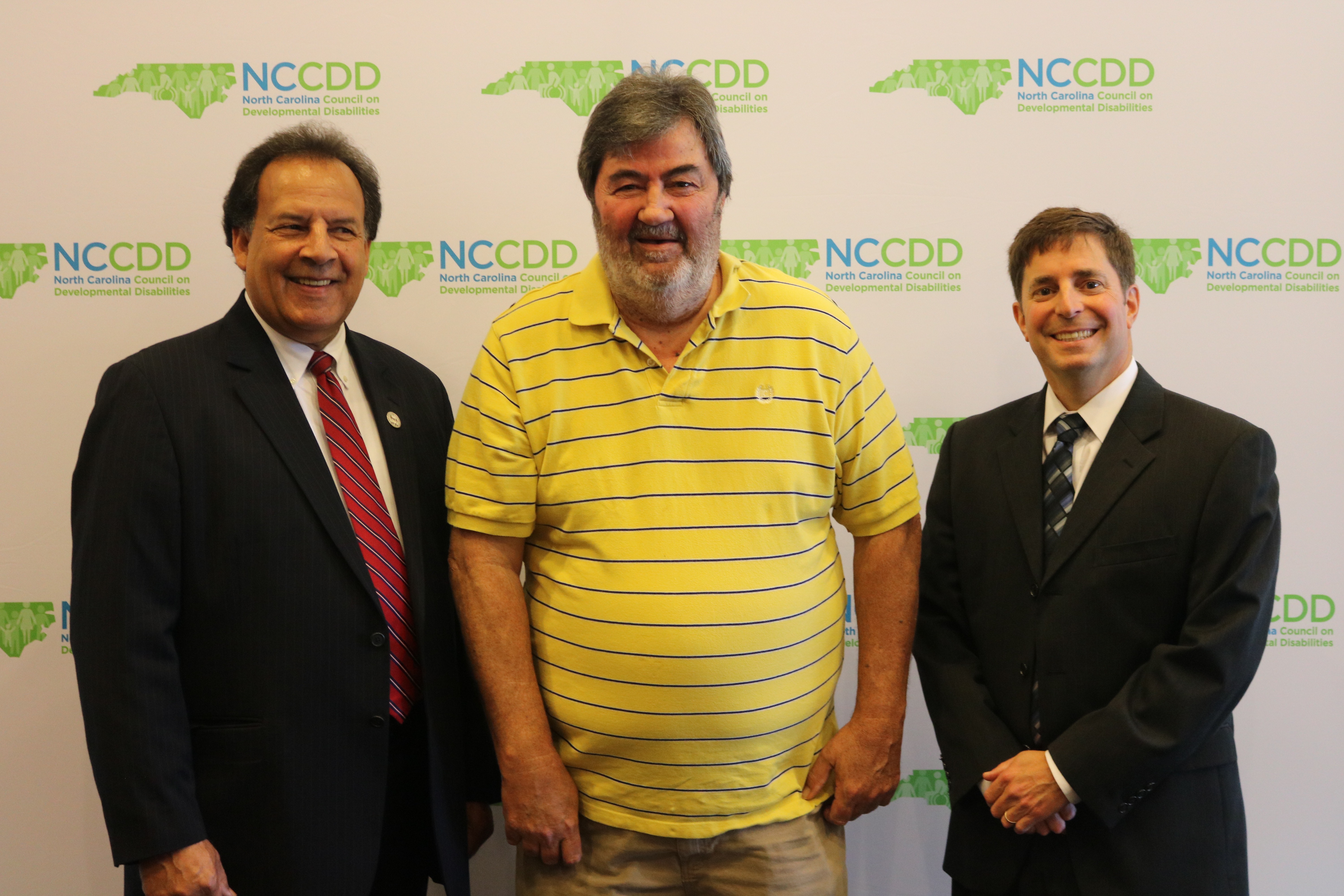 Greg Richardson, NCCDD Council Member Michael Groves and Executive director Chris Egan
