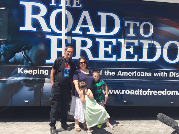 Amanda Bergen and children in Uptown Charlotte before the ADA25 Road to Freedom bus 